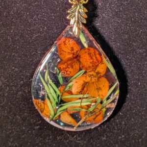 Pendentif fleurs naturelles en résine